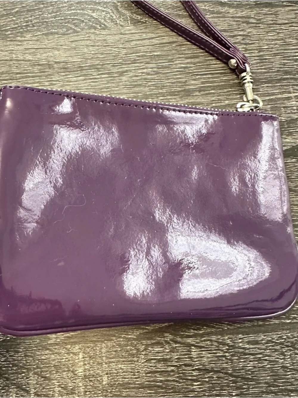 Women’s Express purple wristlet‎